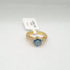 Fancy Blue Diamond Elevated Paved Diamond Engagement Ring 18K