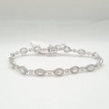 XX Classic White Gold Multi Shape Solitaire Center Halo Pave Diamond Bracelet 14K